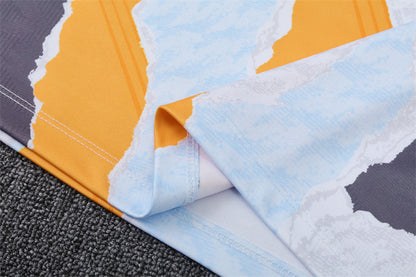 Buzo Completo Real Madrid Diseño Blanco y Naranja