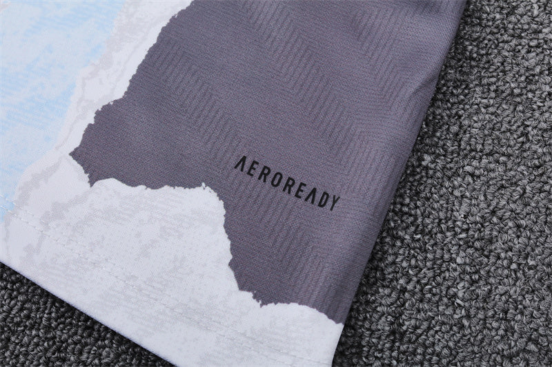 Buzo Completo Real Madrid Diseño Blanco y Naranja