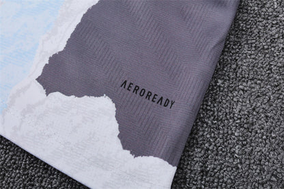 Buzo Completo Real Madrid Diseño Blanco y Naranja