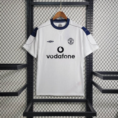 Camiseta Manchester United Retro Visita 1999/00