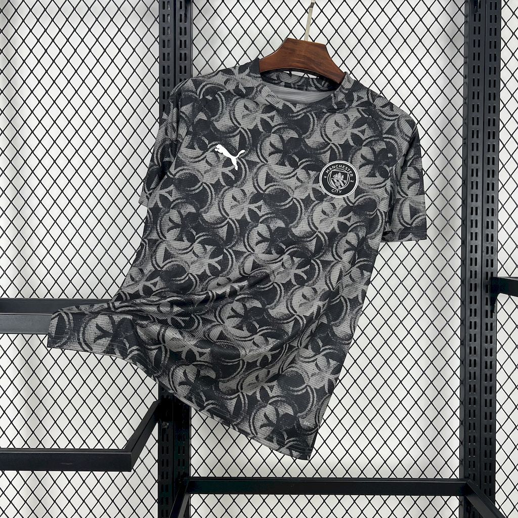 Camiseta Manchester Pre-Partido 2025/26 Versión Fan