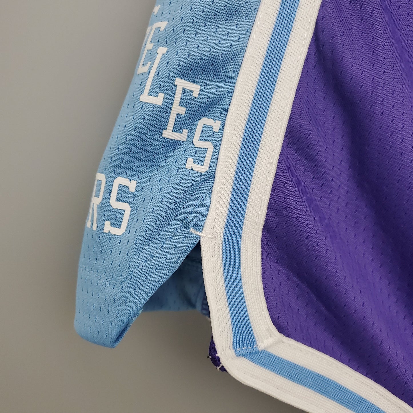 Camiseta Los Ángeles Lakers City Edition Shorts Morados