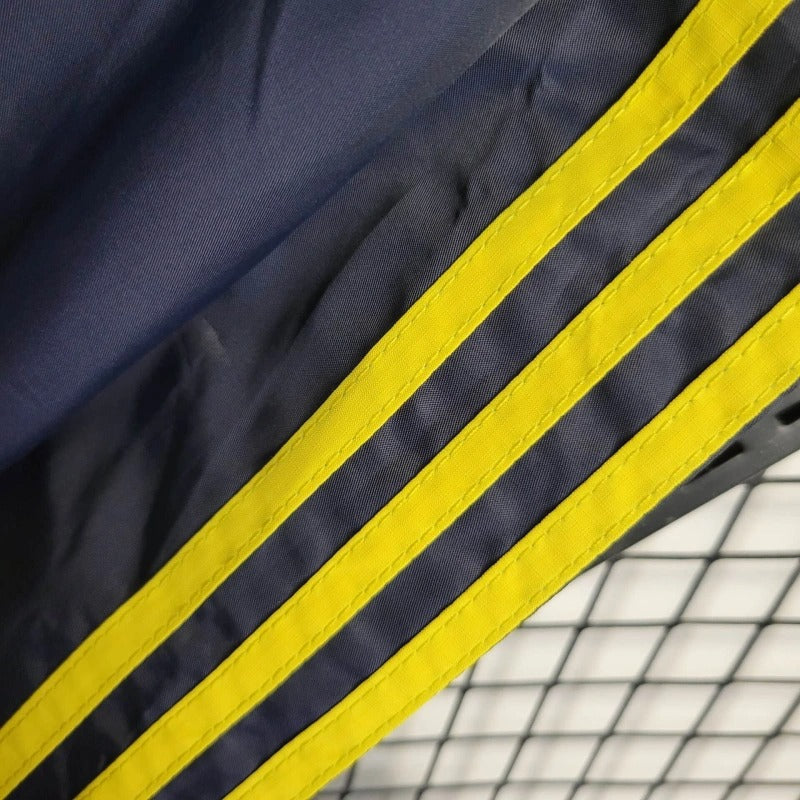 Cortavientos Real Madrid Morado, Amarillo y Azun Marino