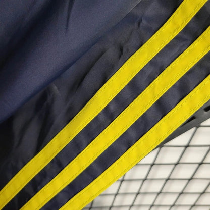 Cortavientos Real Madrid Morado, Amarillo y Azun Marino