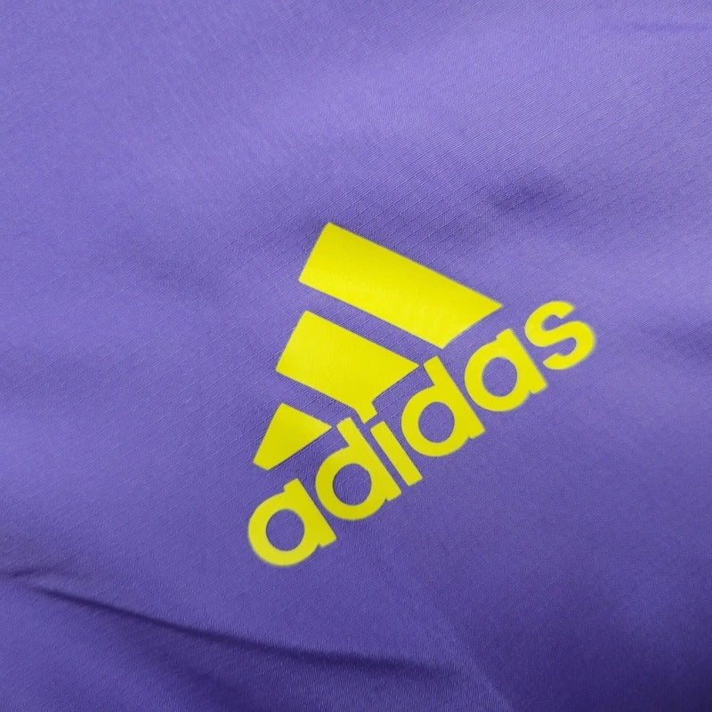 Cortavientos Real Madrid Morado, Amarillo y Azun Marino